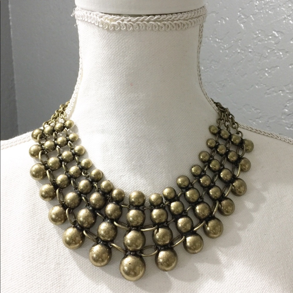Stunning costume jewlery and unusual bronze half bead necklace.